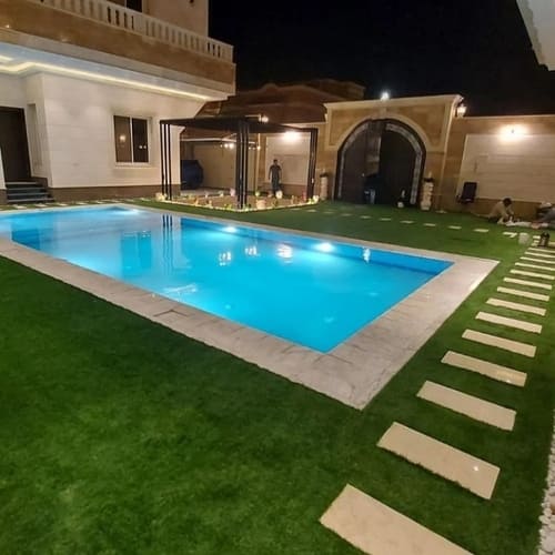Artificial grass lawn installation with pergola and stepping stones — project 2