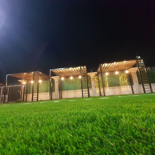 Artificial grass lawn installation with pergola and stepping stones — project 3