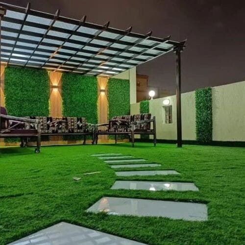 Artificial grass lawn installation with pergola and stepping stones — project 4