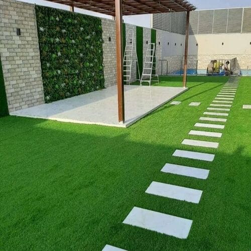Artificial grass lawn installation with pergola and stepping stones — project 9