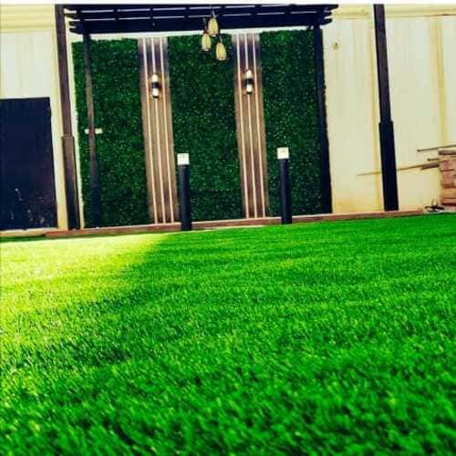 Artificial grass lawn installation with pergola and stepping stones — project 11