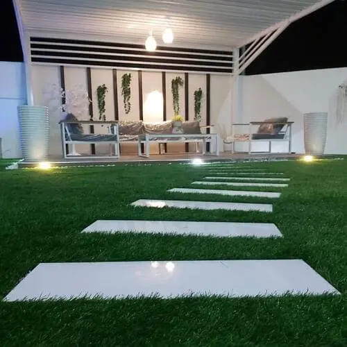 Artificial grass lawn installation with pergola and stepping stones — project 13