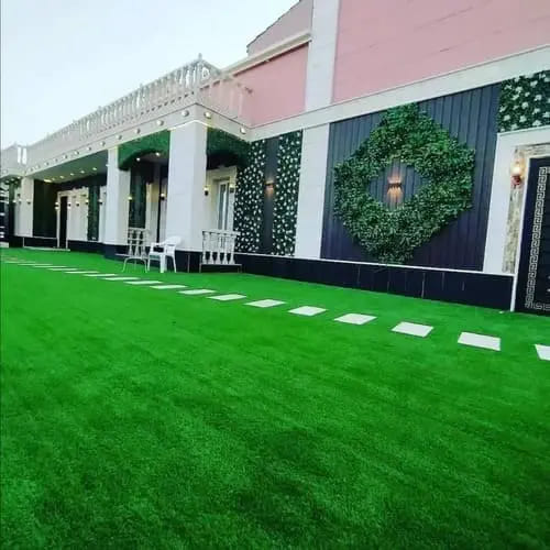 Artificial grass lawn installation with pergola and stepping stones — project 14