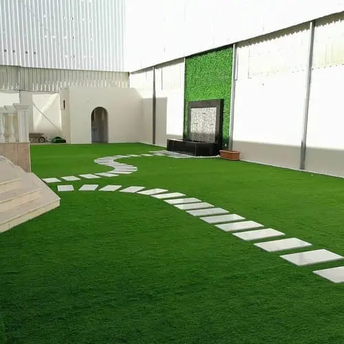Artificial grass lawn installation with pergola and stepping stones — project 20