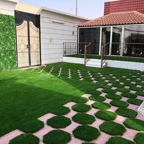 Artificial grass lawn installation with pergola and stepping stones — project 24