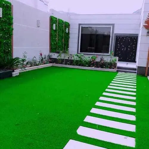 Artificial grass lawn installation with pergola and stepping stones — project 27
