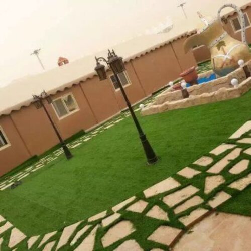 Natural grass turf being supplied and laid for a lawn — project 7