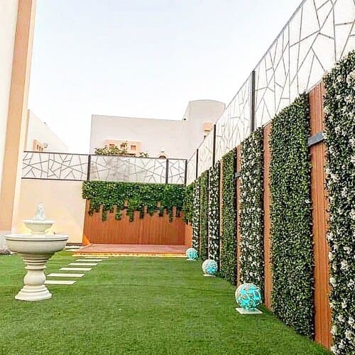 Vertical wall grass green panel installation — project 17