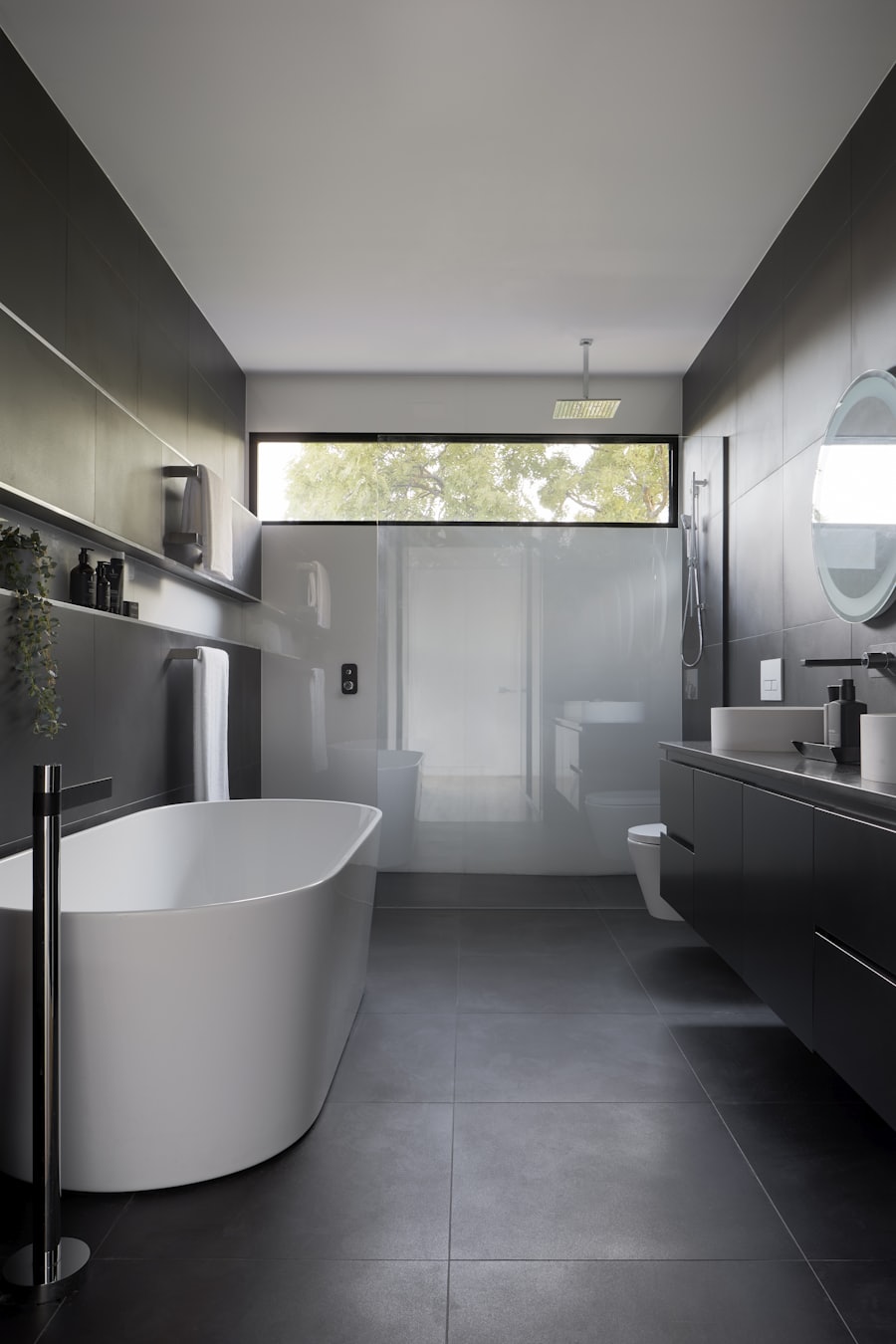 Luxury bathroom with large mirror and glass