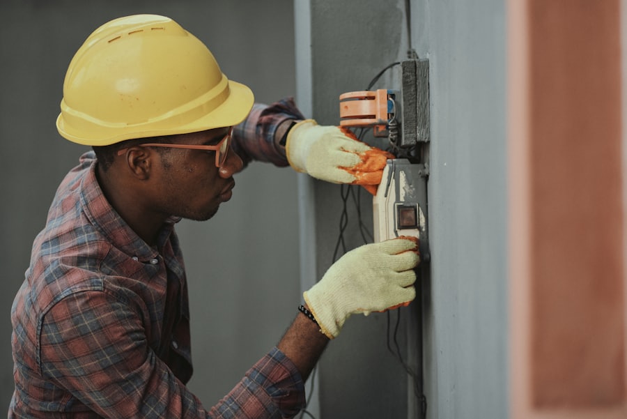 Qualified electrician working safely on site